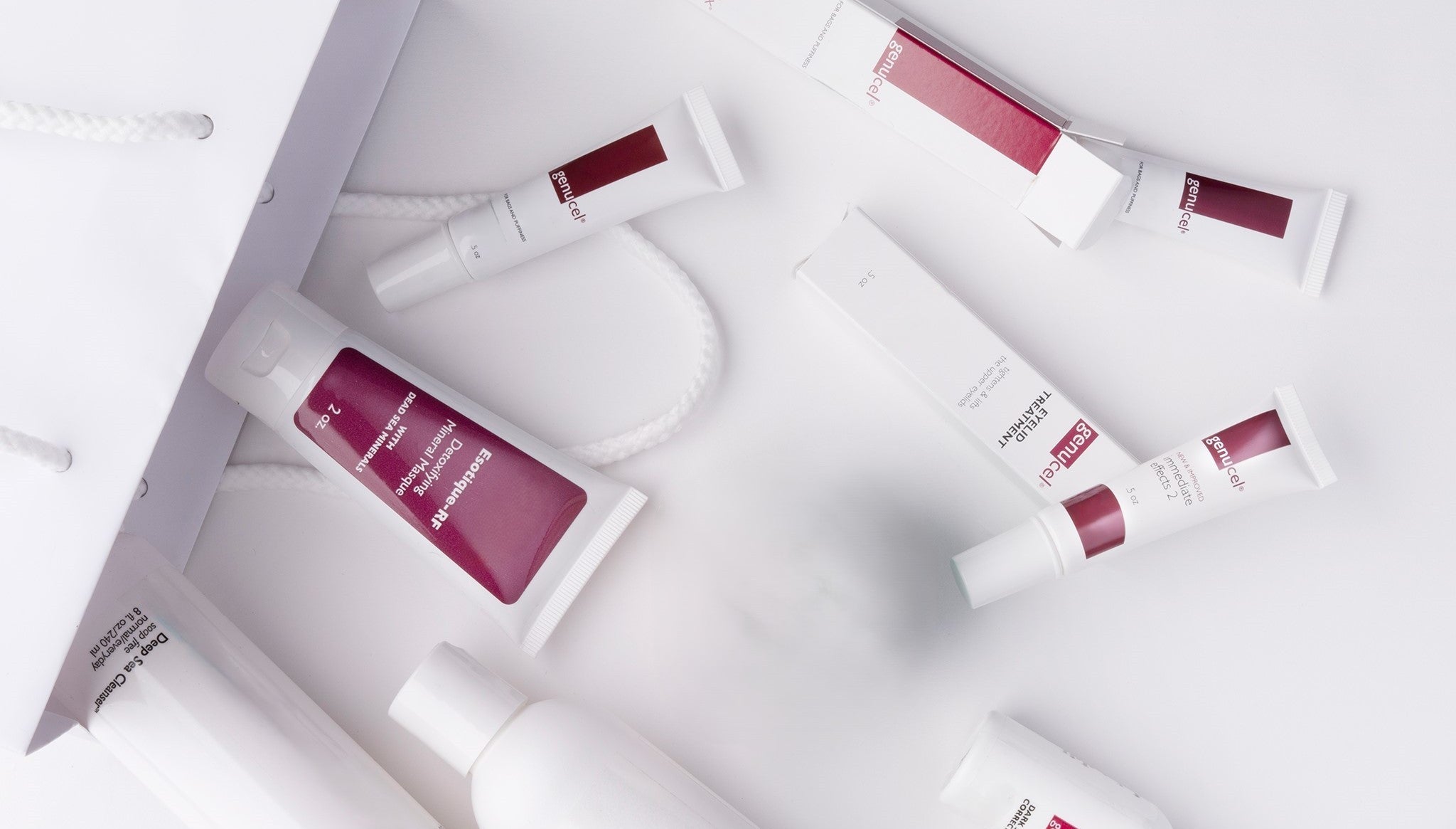 Skincare products with red labels on a white background